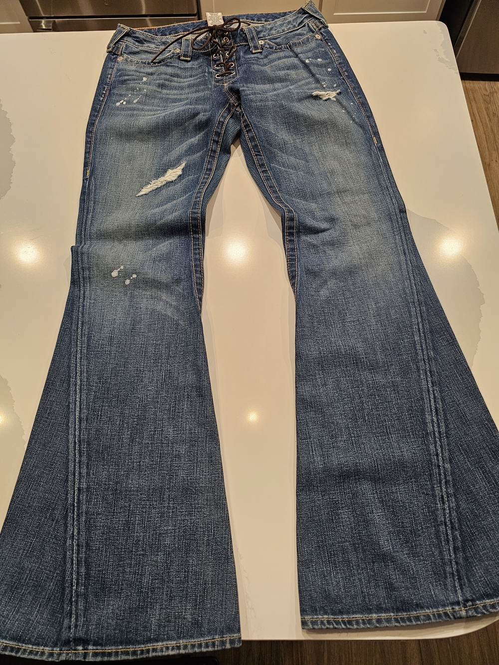 True Religion Lace-Up Flare Jeans in Distressed Blue